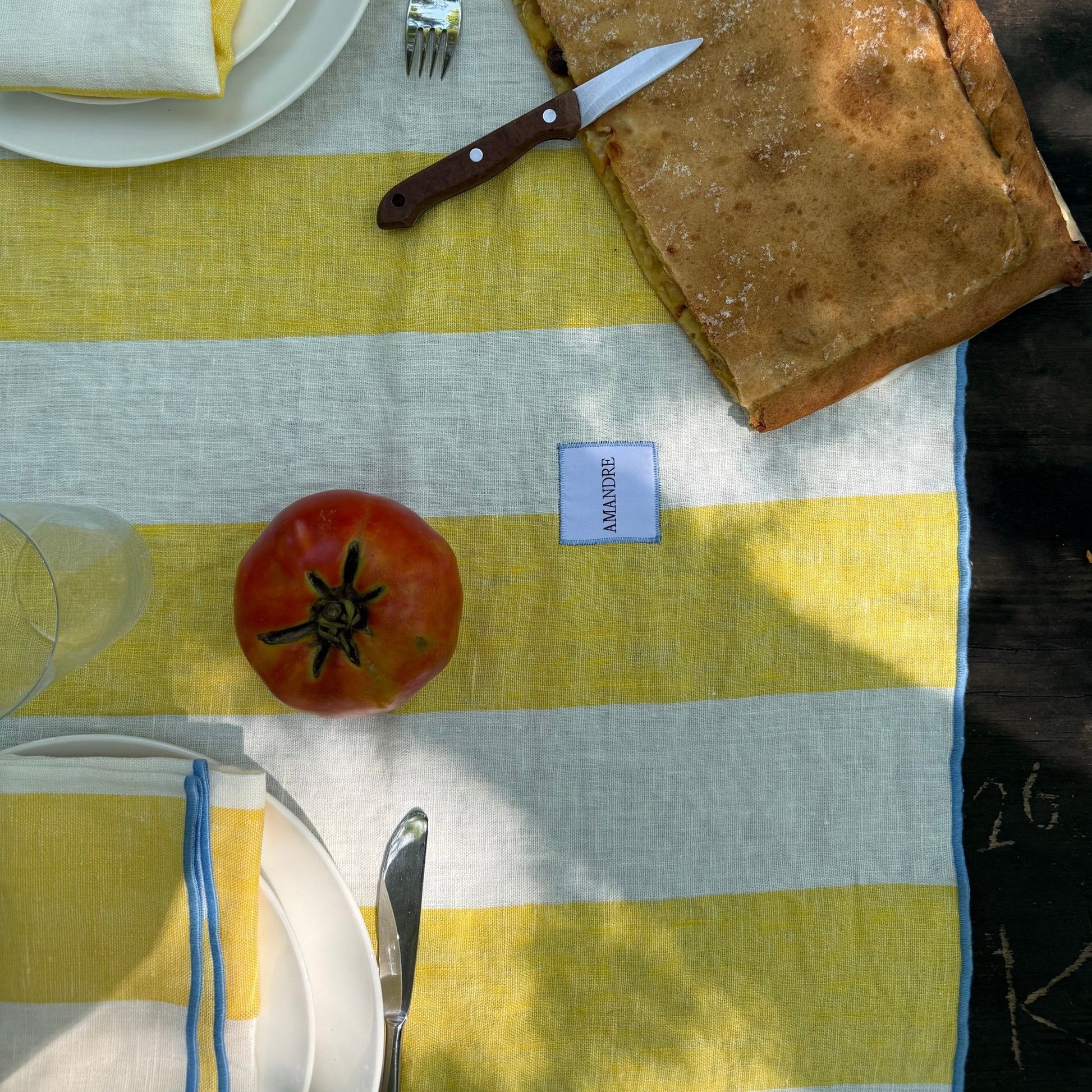 Mantel Eguzkilore - Rayas Amarillo & Blanco · Overlock Celeste - Amandre