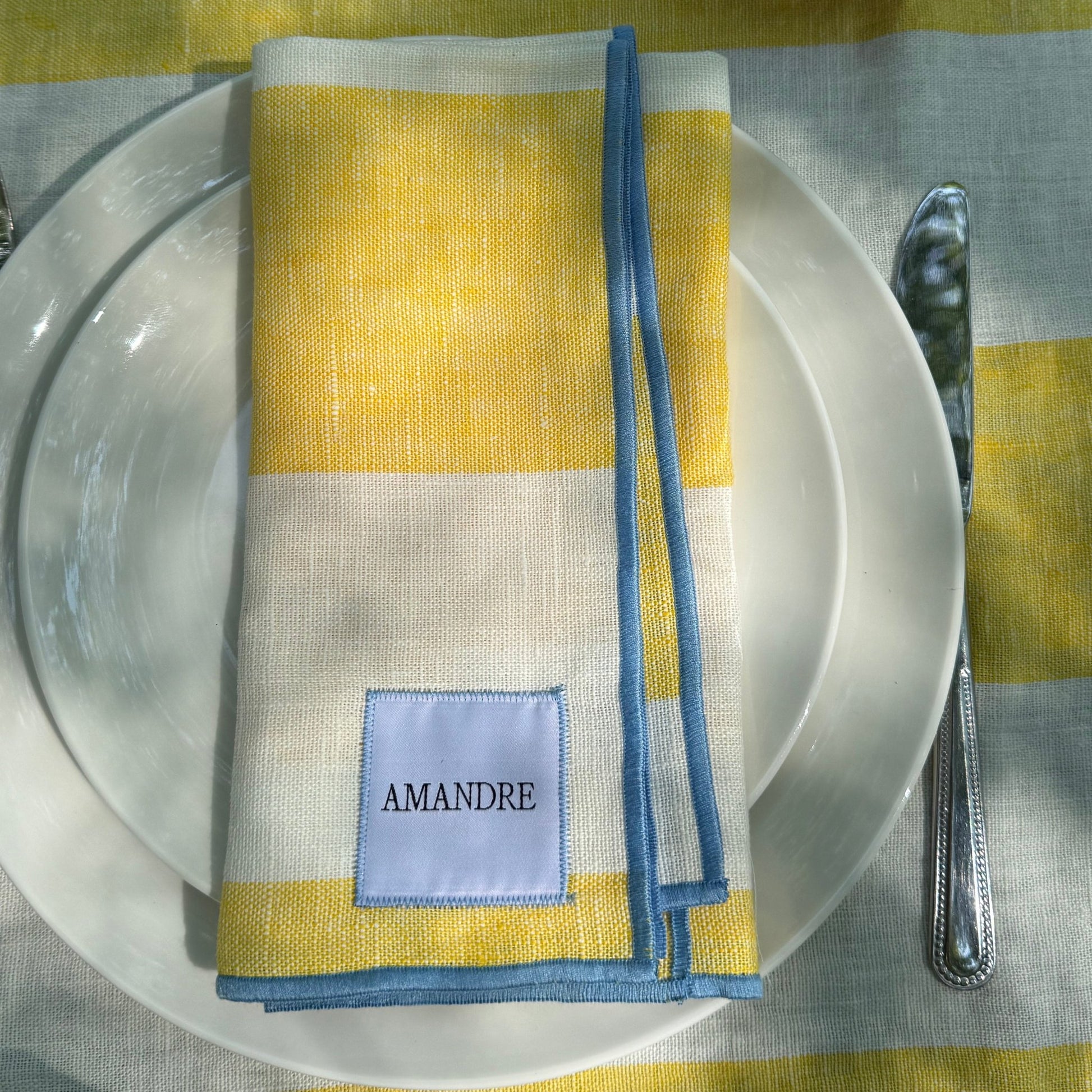 Servilletas Eguzkilore - Rayas Amarillo & Blanco · Overlock Celeste - Amandre