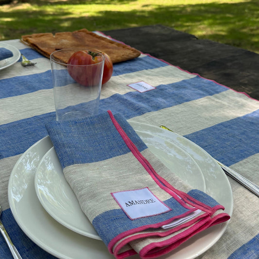 Servilletas Itsasbide - Rayas Azul & Lino · Overlock Fucsia - Amandre